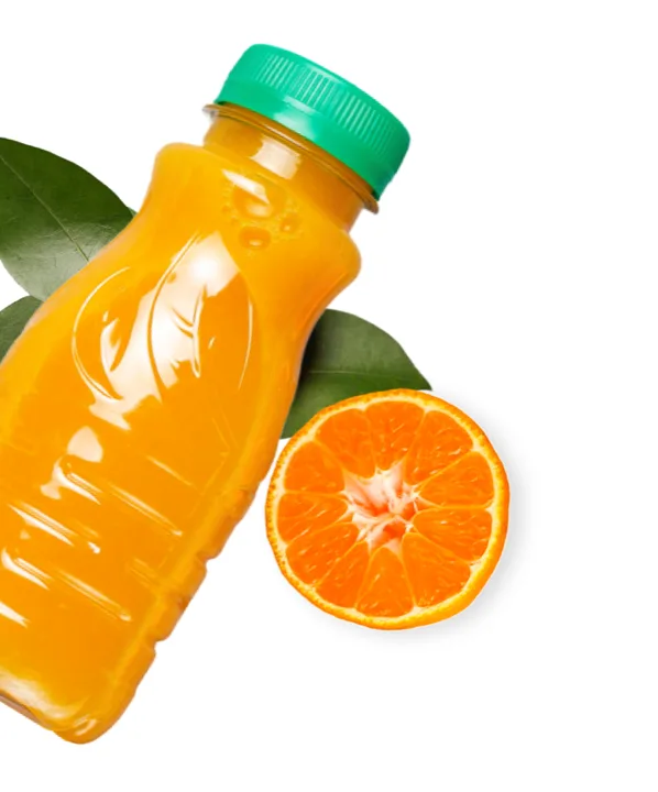 Juice bottle, orange and leaves — foods preserved with HPP